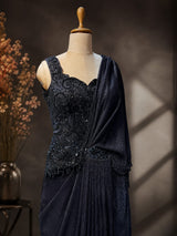Scalloped sweetheart neckline on the midnight navy beaded blouse