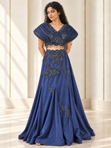 Midnight blue skirt set with a sculpted floral-beaded cape top, front view