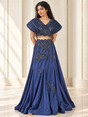 Midnight blue skirt set with a sculpted floral-beaded cape top, front view