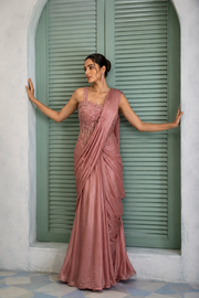 Rose pink draped saree with a sequin embellished corset blouse