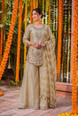 Champagne gold palazzo set with silver floral embroidery and a striped tassel dupatta