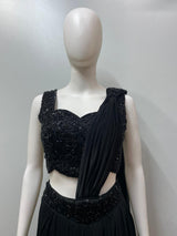 Full-length view of a black sequin pre-draped saree set