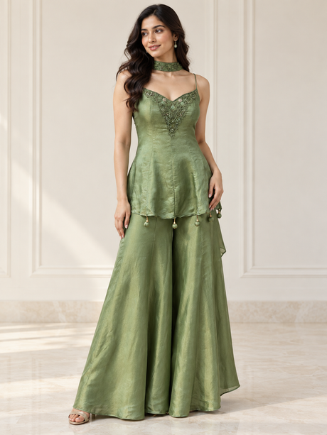Sage green jewel peplum palazzo set with fitted top and wide-leg pants