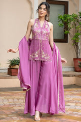 Deep V halter neckline with antique gold beadwork and ivory floral motifs