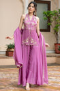 Deep V halter neckline with antique gold beadwork and ivory floral motifs