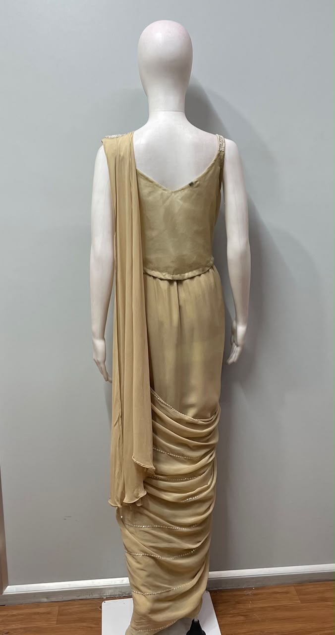 Champagne pearl draped saree styled for an evening celebration
