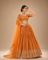 Saffron Orange Silver Zari Lehenga Ensemble