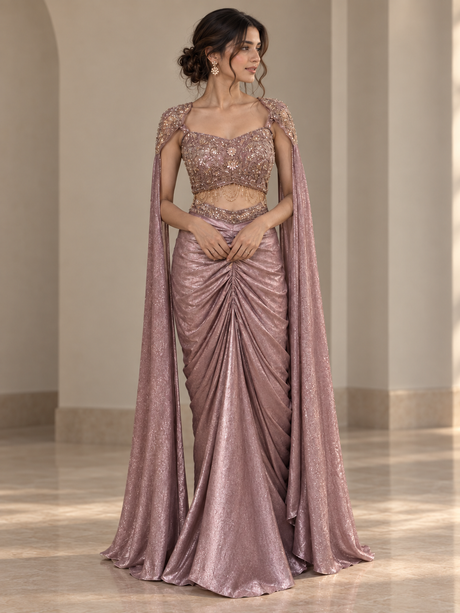 Smoky mauve draped skirt set with a gold jewelled blouse and shoulder drapes