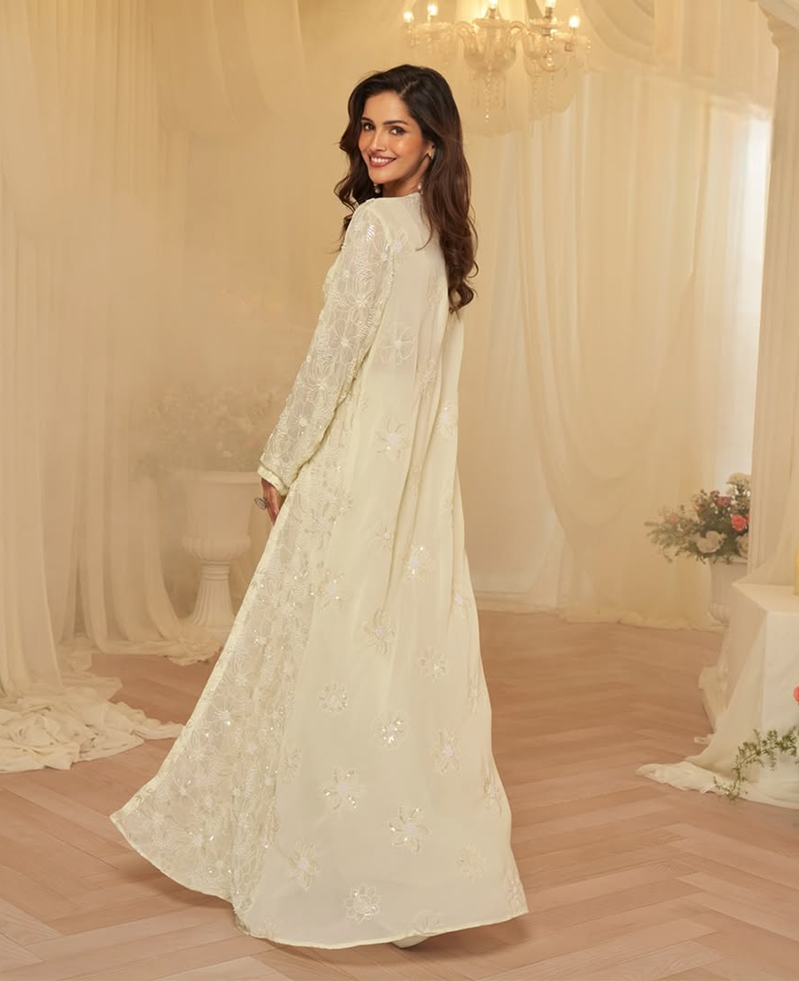 Ivory Glow Draped Lehenga with Embroidered Cape