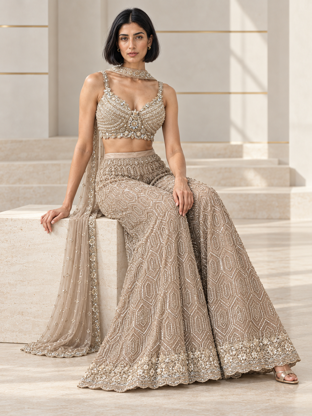Champagne taupe palazzo set with a pearl jewel blouse and geometric beadwork
