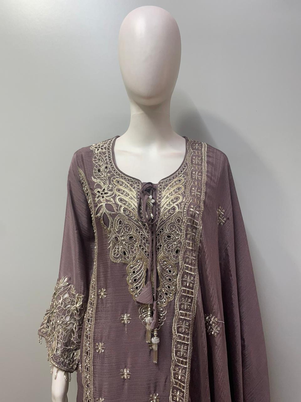 Full-length view of a mocha zari embroidered palazzo set