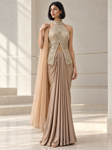 Champagne gold skirt set with a jewel halter top, draped pleats and a sheer dupatta