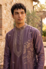 Landscape-inspired embroidered border along the lower front of the kurta