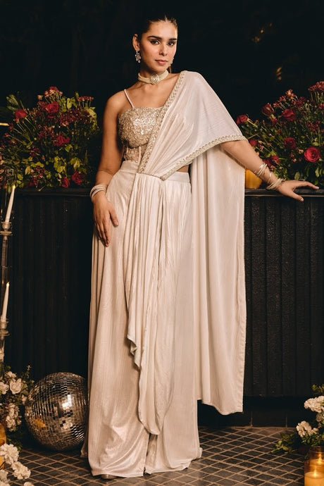 Champagne ivory crystal draped palazzo saree set with bustier blouse and pallu