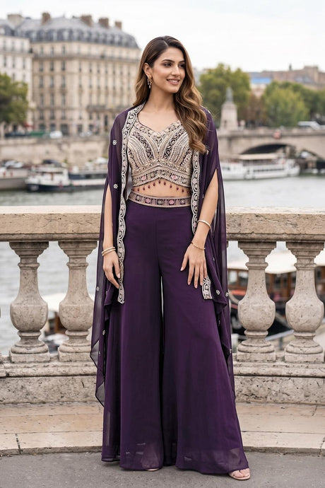 Deep plum palazzo set with silver jewel crop blouse and sheer floor-length cape