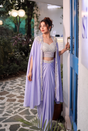 Lilac saree worn with a pearl detailed cape and fitted blouse