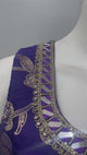 Royal purple gold embroidered palazzo set shown in movement on the model
