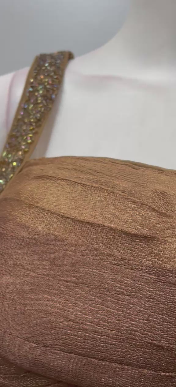 Copper bronze corset saree set filmed from the front and side