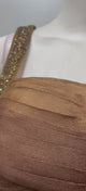 Copper bronze corset saree set filmed from the front and side