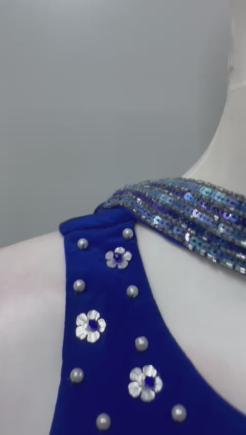 Royal blue silver embellished lehenga set shown in movement