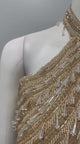 Champagne shimmer halter lehenga shown in movement on the model