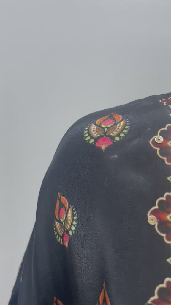 Nomad print kaftan co-ord set shown in movement on the model