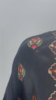Nomad print kaftan co-ord set shown in movement on the model