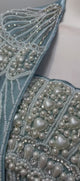 Ice blue pearl cape saree set shown in movement