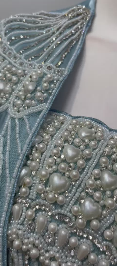 Ice blue pearl cape saree set shown in movement