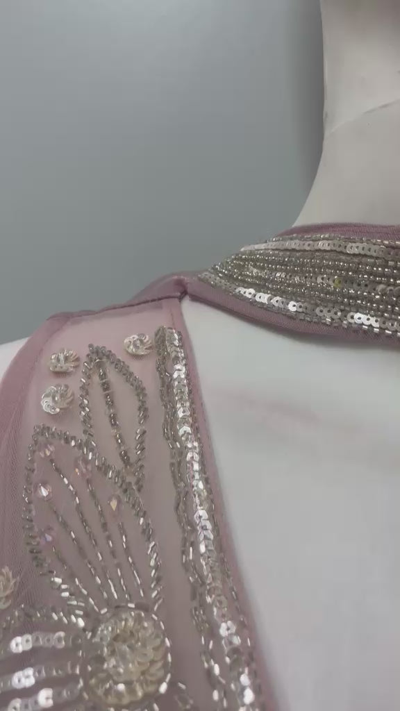 Dusty pink embroidered palazzo set shown in movement on the model