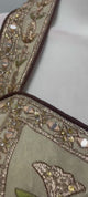 Ivory gold corset embroidered lehenga shown in movement on model
