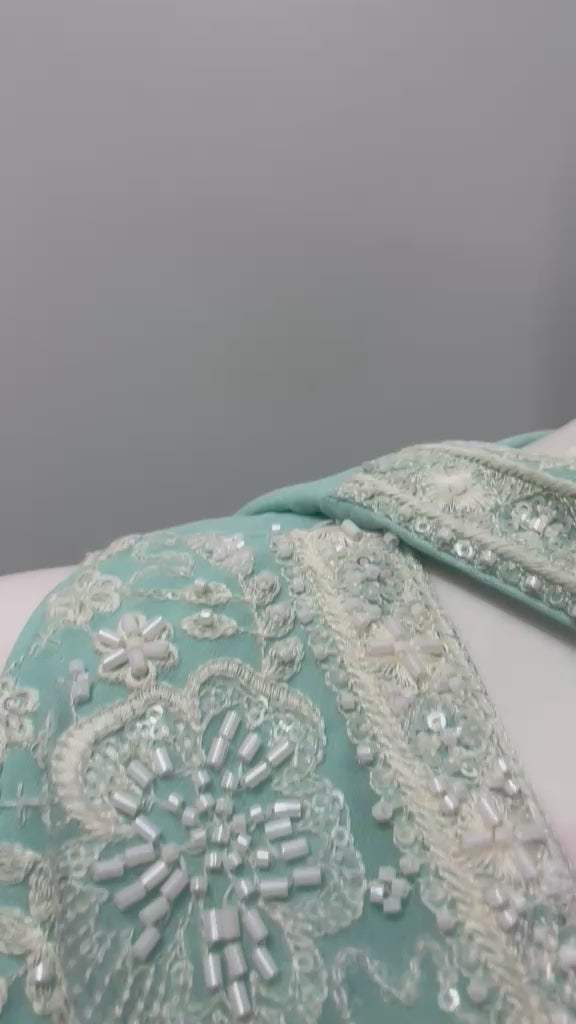 Aqua mint silver jewel palazzo set shown in movement on the model