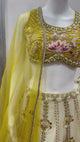 Mustard floral lehenga choli set filmed from the front and side