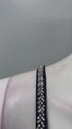 Noir silver embellished pre-draped saree shown in movement on model