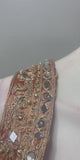 Peach gold jewel corset lehenga set shown in movement