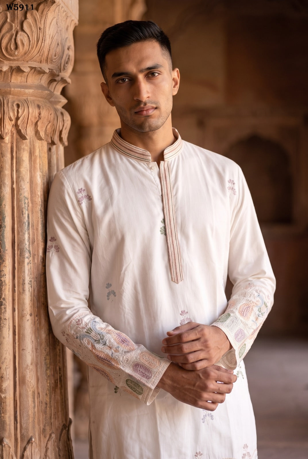 Band collar and embroidered front placket on the ivory men's kurta