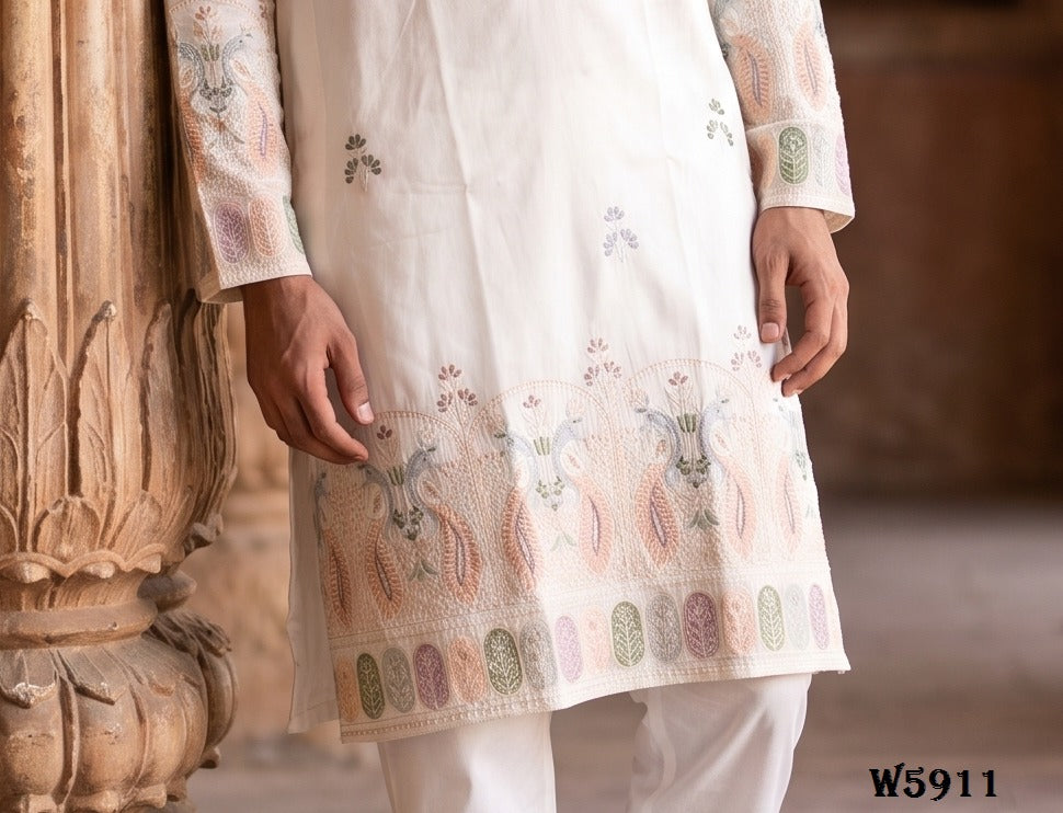 Sleeve and cuff embroidery in muted sage, dusty peach and pale gold tones
