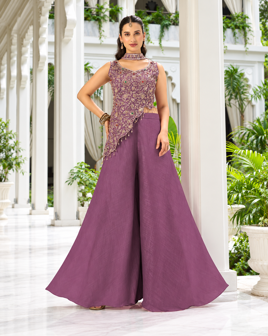 Dusty mauve asymmetric top with gold floral embroidery and palazzo pants