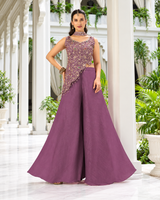 Dusty mauve asymmetric top with gold floral embroidery and palazzo pants