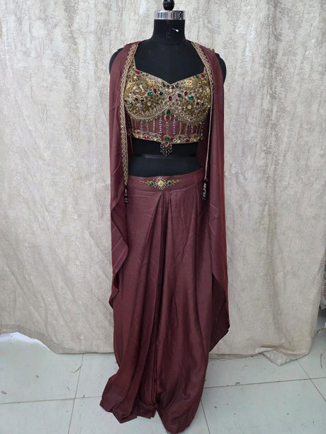 Sheer embroidered cape layered over the smoky mauve jewel crop blouse and dhoti pants
