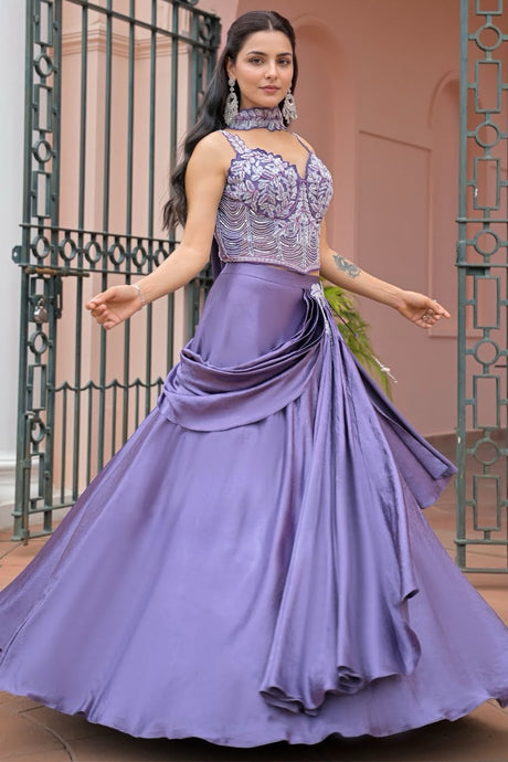Smoky lavender draped lehenga set with a silver crystal corset blouse