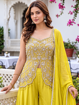 Asymmetric peplum panels over the lemon yellow palazzo silhouette