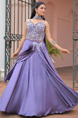 Flared lavender lehenga skirt with a draped hip panel and silver floral applique