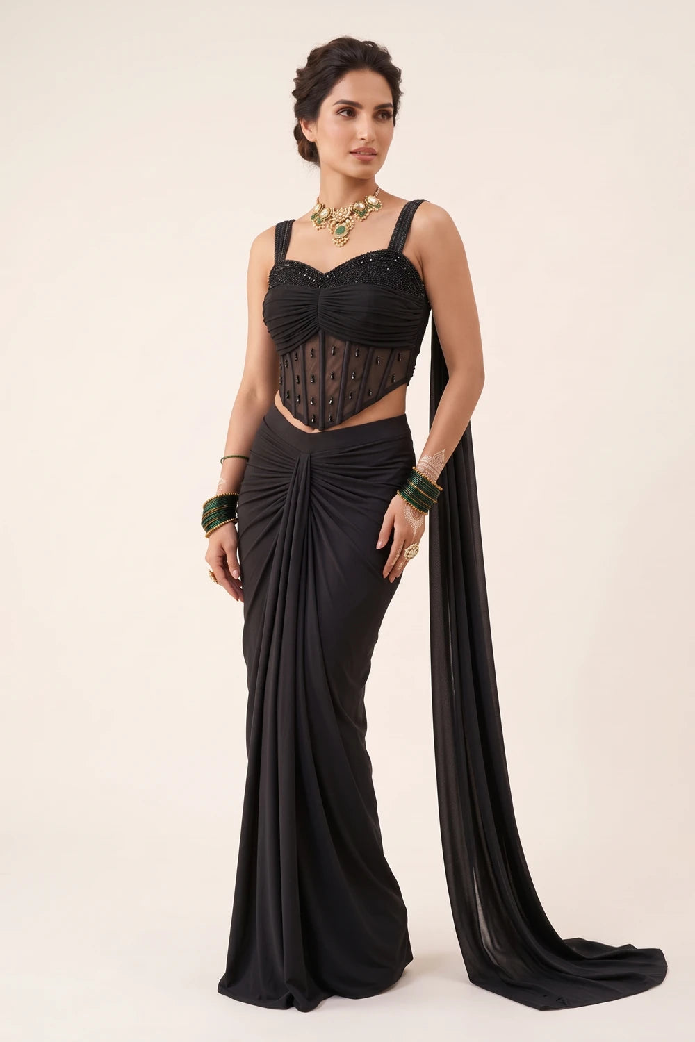 Midnight black corset with tonal sequin work and a draped floor-length skirt